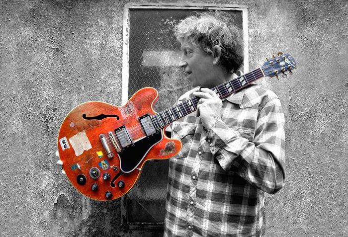 The red guitar was made in 1959, around the time Elvin Bishop moved to the South Side of Chicago and entered the blues scene. Photo by Joshua Temkin, Delta Groove Music.