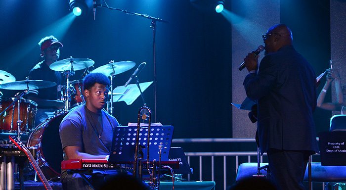 Porter's youngest and oldest sons, Tevien, drums, and Cliff Jr., keyboards, keep their eyes on dad. Tim Parsons / Tahoe Onstage