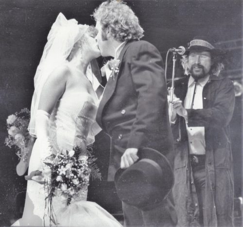 Country Dick Montana lassos Vicki and Joey Harris as they tie the knot in front of 30,000 at San Diego's Street Scene in 1990.